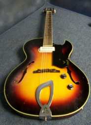 Guild T-100 1963 sunburst w-newer Guild case bottom.jpg